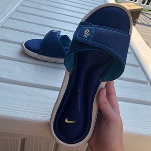 Nike slide ons